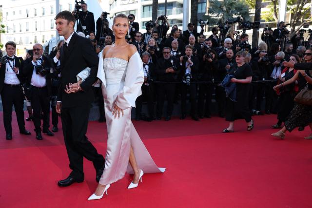 US model Anwar Hadid and US model Bella Hadid arrive for the screening of the film "Garance" (Another Day) at the 79th edition of the Cannes Film Festival in Cannes, southern France on May 17, 2026. (Photo by Thibaud MORITZ / AFP)