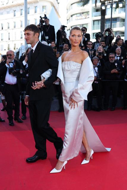 US model Anwar Hadid and US model Bella Hadid arrive for the screening of the film "Garance" (Another Day) at the 79th edition of the Cannes Film Festival in Cannes, southern France on May 17, 2026. (Photo by Thibaud MORITZ / AFP)