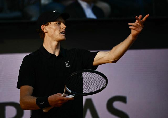 Italy's Jannik Sinner reacts during the match against Norway's Casper Ruud during the men's final of the ATP Rome Open tennis tournament at Foro Italico in Rome on May 17, 2026. (Photo by Filippo MONTEFORTE / AFP)