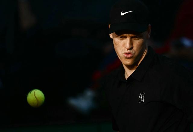 Italy's Jannik Sinner reacts during the match against Norway's Casper Ruud during the men's final of the ATP Rome Open tennis tournament at Foro Italico in Rome on May 17, 2026. (Photo by Filippo MONTEFORTE / AFP)