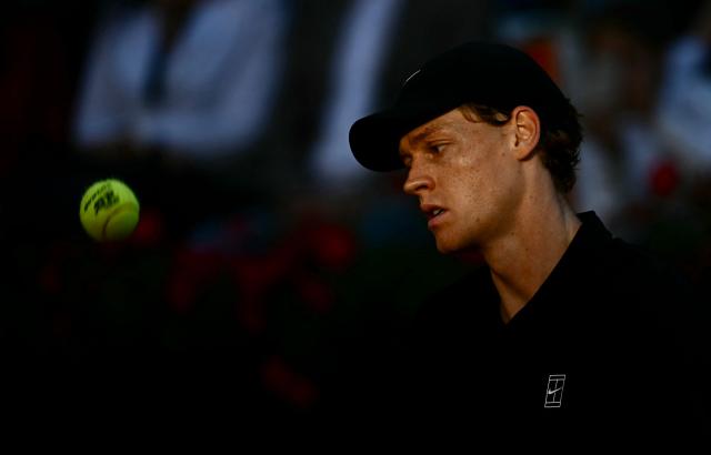 Italy's Jannik Sinner reacts during the match against Norway's Casper Ruud during the men's final of the ATP Rome Open tennis tournament at Foro Italico in Rome on May 17, 2026. (Photo by Filippo MONTEFORTE / AFP)
