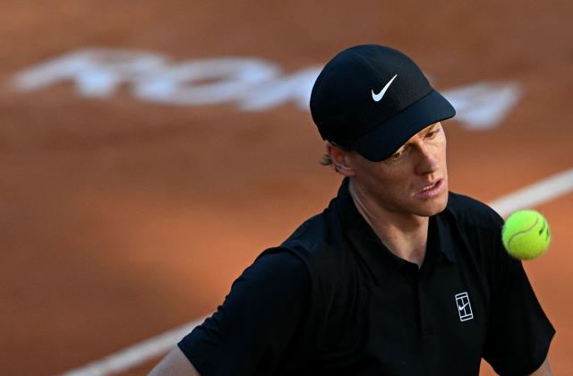 Italy's Jannik Sinner reacts during the match against Norway's Casper Ruud during the men's final of the ATP Rome Open tennis tournament at Foro Italico in Rome on May 17, 2026. (Photo by Tiziana FABI / AFP)