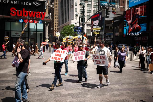 Long Island Rail Road (LIRR) workers picket in front of Penn Station in New York City on May 17, 2026. LIRR workers went on strike after midnight on May 16 after failing to reach a new contract with the Metropolitan Transportation Authority. The LIRR is North America's largest commuter rail system with approximately 250,000 daily weekday riders. (Photo by CHARLY TRIBALLEAU / AFP)