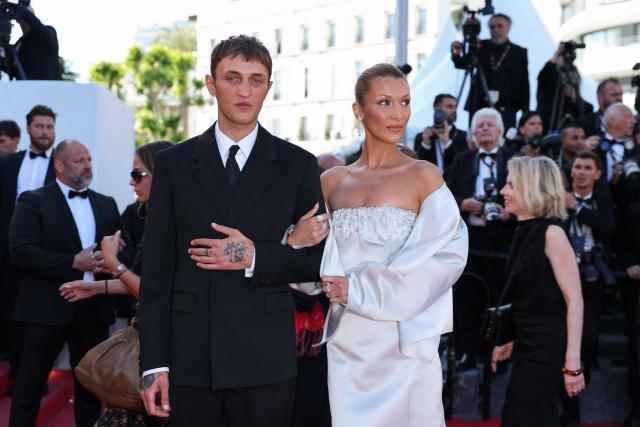 US model Anwar Hadid and US model Bella Hadid arrive for the screening of the film "Garance" (Another Day) at the 79th edition of the Cannes Film Festival in Cannes, southern France on May 17, 2026. (Photo by Thibaud MORITZ / AFP)