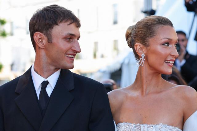 US model Anwar Hadid and US model Bella Hadid arrive for the screening of the film "Garance" (Another Day) at the 79th edition of the Cannes Film Festival in Cannes, southern France on May 17, 2026. (Photo by Thibaud MORITZ / AFP)
