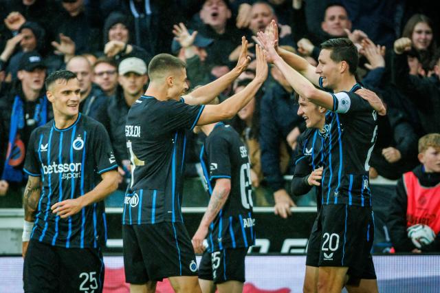 Club's Belgian midfielder Hans Vanaken (R) celebrates after scoring during the Belgian "Pro League" First Division football match between Club Brugge KV and Union Saint-Gilloise (USG - Saint Gilles) at the Jan Breydel Stadium in Bruges on May 17, 2026. (Photo by KURT DESPLENTER / Belga / AFP) / Belgium OUT