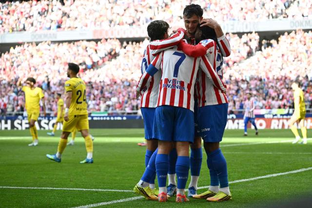 Atletico Madrid players celebrate the opening goal scored by English forward #22 Ademola Lookman during the Spanish league football match between Club Atletico de Madrid and Girona FC at the Metroplitano stadium in Madrid on May 17, 2026. (Photo by Javier SORIANO / AFP)