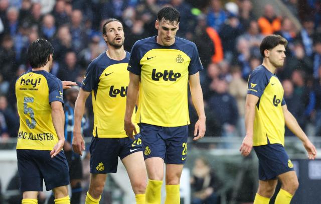 Union's Christian Burgess (2ndL) and Union's Ross Sykes (C) react during the Belgian "Pro League" First Division football match between Club Brugge KV and Union Saint-Gilloise (USG - Saint Gilles) at the Jan Breydel Stadium in Bruges on May 17, 2026. (Photo by VIRGINIE LEFOUR / BELGA / AFP) / Belgium OUT