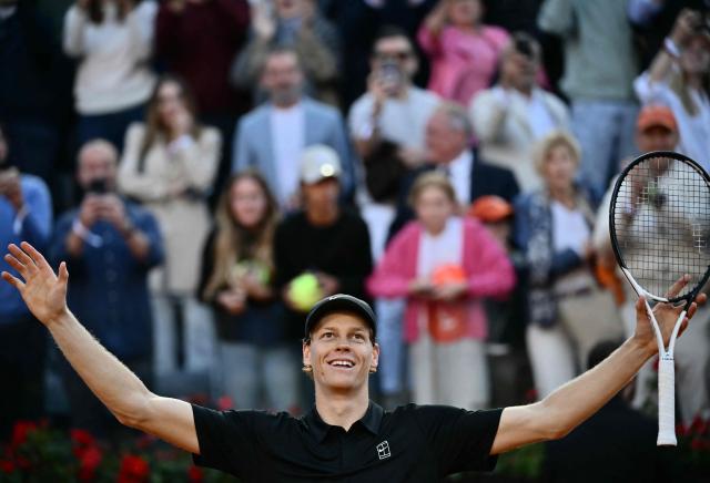 Italy's Jannik Sinner celebrates after winning the men's final of the ATP Rome Open tennis tournament against Norway's Casper Ruud at the Foro Italico in Rome on May 17, 2026. (Photo by Filippo MONTEFORTE / AFP)