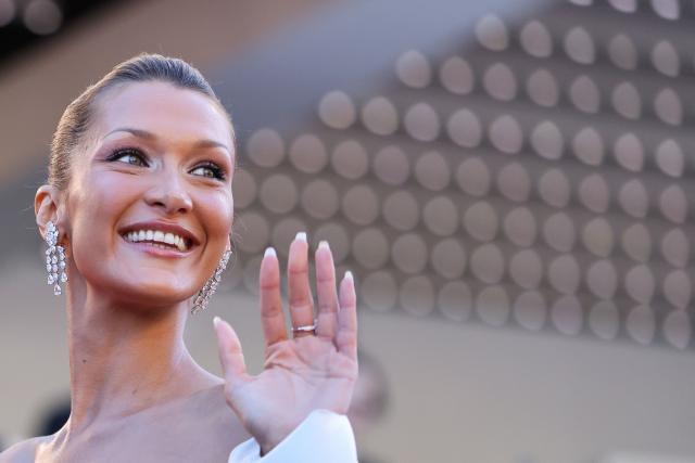 US model Bella Hadid arrives for the screening of the film "Garance" (Another Day) at the 79th edition of the Cannes Film Festival in Cannes, southern France on May 17, 2026. (Photo by Thibaud MORITZ / AFP)