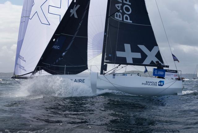 French skipper Loïs Berrehar sails on his boat "Banque Populaire" before the start of the Solitaire du Figaro, a single-handed multi-stage sailing race, in Perros-Guirrec, western France, May 17, 2026. (Photo by Fred TANNEAU / AFP)