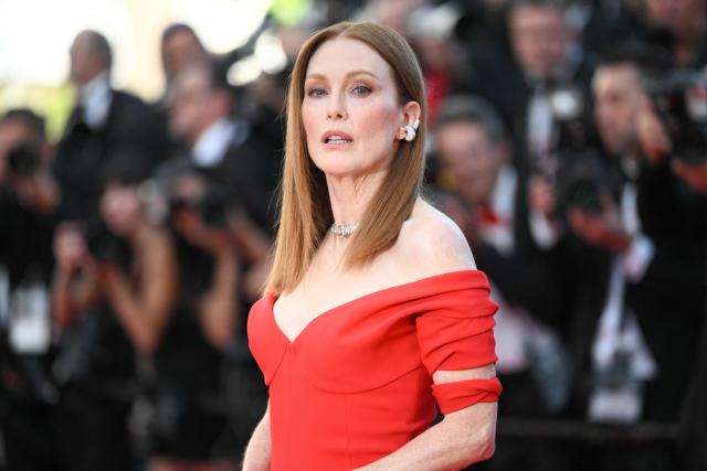 US actress Julianne Moore arrives for the screening of the film "Garance" (Another Day) at the 79th edition of the Cannes Film Festival in Cannes, southern France on May 17, 2026. (Photo by Olivier CHASSIGNOLE / AFP)