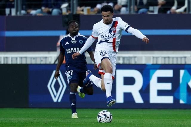 Paris Saint-Germain's French midfielder #33 Warren Zaire-Emery (R) controls the ball during the French L1 football match between Paris FC and Paris Saint-Germain (PSG) at the Stade Jean-Bouin in Paris on May 17, 2026. (Photo by Kenzo TRIBOUILLARD / AFP)