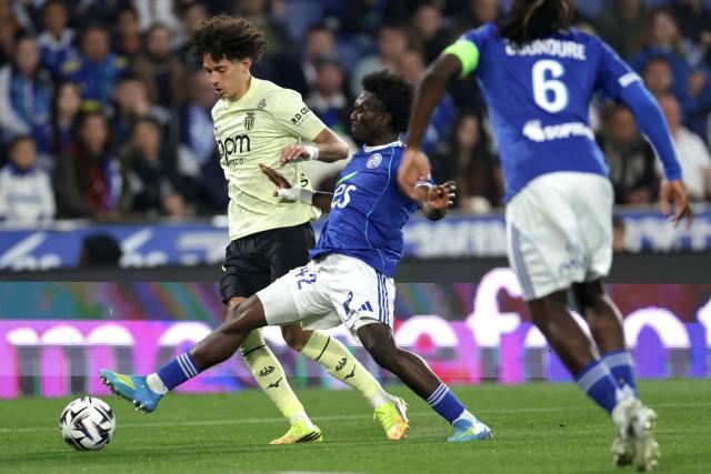 Monaco’s midfielder #11 Maghnes Akliouche (L) fights for the ball with Strasbourg’s Ivorian forward #42 Abdoul Ouattara during the French L1 football match between RC Strasbourg Alsace and AS Monaco at the Stade de la Meinau in Strasbourg, eastern France, on May 17, 2026. (Photo by ROMEO BOETZLE / AFP)