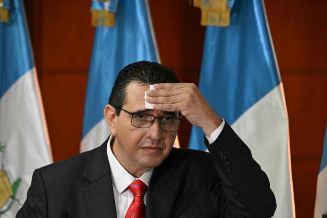 Guatemala's new attorney general Gabriel Garcia Luna gestures during a press conference at the Public Ministry headquarters in Guatemala City on May 17, 2026. García Luna, took office this Sunday and pledged to restore confidence in the institution and to fight corruption and organized crime, following the departure of Consuelo Porras, who has been sanctioned by more than 40 countries. (Photo by JOHAN ORDONEZ / AFP)