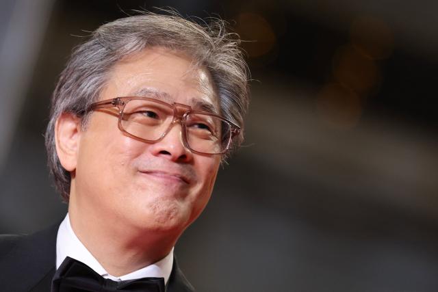 President of the jury South Korean director, screenwriter and producer Park Chan-wook arrives for the screening of the film "Hope" at the 79th edition of the Cannes Film Festival in Cannes, southern France on May 17, 2026. (Photo by Thibaud MORITZ / AFP)
