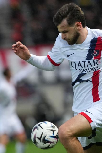 Paris Saint-Germain's Georgian forward #07 Khvicha Kvaratskhelia controls the ball during the French L1 football match between Paris FC and Paris Saint-Germain (PSG) at the Stade Jean-Bouin in Paris on May 17, 2026. (Photo by Dimitar DILKOFF / AFP)