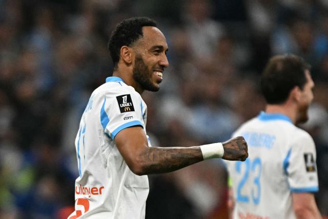 Marseille's Gabonese forward #17 Pierre-Emerick Aubameyang celebrates scoring his team's third goal during the French L1 football match between Olympique de Marseille (OM) and Stade Rennais FC at the Stade Velodrome in Marseille, southern France, on May 17, 2026. (Photo by Gabriel BOUYS / AFP)
