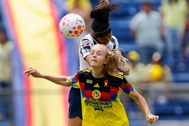 America's Brazilian defender #02 Isadora Haas (front) and Monterrey's defender #14 Alejandra Calderon fight for the ball during the Liga MX Femenil women's Clausura final second-leg football match between America and Monterrey at the Ciudad de los Deportes stadium in Mexico City on May 17, 2026. (Photo by Rodrigo Oropeza / AFP)