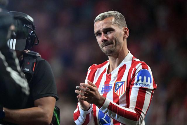 Atletico Madrid's French forward #07 Antoine Griezmann gets emotional during a farewell ceremony after the Spanish league football match between Club Atletico de Madrid and Girona FC at the Metroplitano stadium in Madrid on May 17, 2026. French forward Antoine Griezmann received a warm goodbye from the club's supporters today. Atletico's all-time top goalscorer will head to the United States to play for MLS side Orlando City. (Photo by Javier SORIANO / AFP)