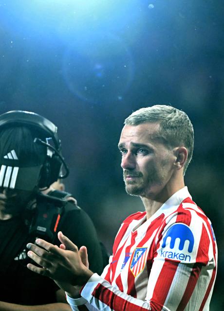 Atletico Madrid's French forward #07 Antoine Griezmann gets emotional during a farewell ceremony after the Spanish league football match between Club Atletico de Madrid and Girona FC at the Metroplitano stadium in Madrid on May 17, 2026. French forward Antoine Griezmann received a warm goodbye from the club's supporters today. Atletico's all-time top goalscorer will head to the United States to play for MLS side Orlando City. (Photo by Javier SORIANO / AFP)