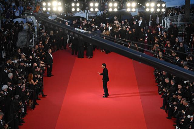 French actor Francois Civil poses as he leaves after the screening of the film "Garance" (Another Day) at the 79th edition of the Cannes Film Festival in Cannes, southern France on May 17, 2026. (Photo by Antonin THUILLIER / AFP)