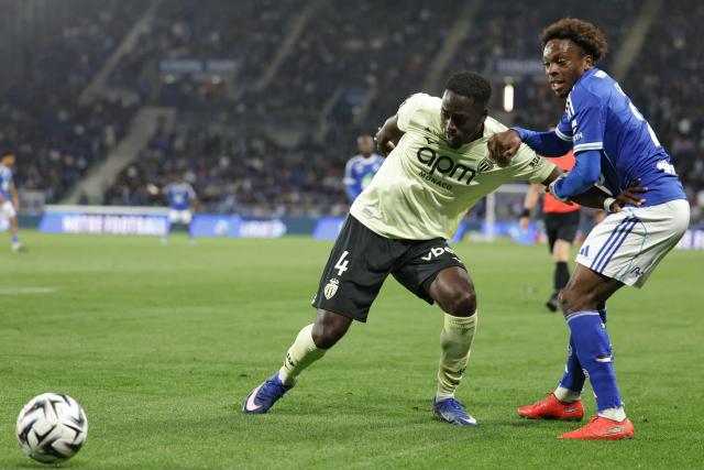 Monaco’s Dutch defender #04 Jordan Teze (L) fights for the ball with Strasbourg’s Ivorian forward #20 Martial Godo during the French L1 football match between RC Strasbourg Alsace and AS Monaco at the Stade de la Meinau in Strasbourg, eastern France, on May 17, 2026. (Photo by ROMEO BOETZLE / AFP)
