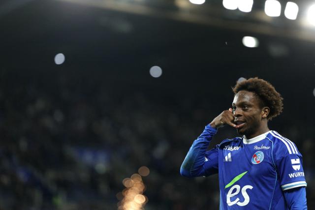 trasbourg’s Ivorian forward #20 Martial Godo celebrates after scoring his team’s fifth goal during the French L1 football match between RC Strasbourg Alsace and AS Monaco at the Stade de la Meinau in Strasbourg, eastern France, on May 17, 2026. (Photo by ROMEO BOETZLE / AFP)