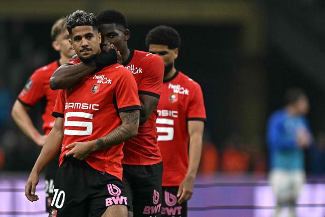 Rennes' French forward #10 Ludovic Blas (L) reacts during the French L1 football match between Olympique de Marseille (OM) and Stade Rennais FC at the Stade Velodrome in Marseille, southern France, on May 17, 2026. (Photo by Gabriel BOUYS / AFP)