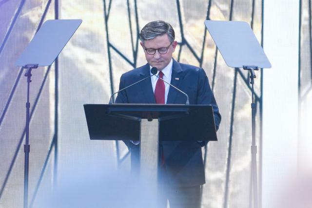 US Speaker of the House Mike Johnson delivers a prayer during "Rededicate 250: A National Jubilee of Prayer, Praise and Thanksgiving" on the National Mall in Washington, DC, on May 17, 2026. (Photo by Matthew Hatcher / AFP)
