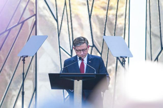 US Speaker of the House Mike Johnson delivers a prayer during "Rededicate 250: A National Jubilee of Prayer, Praise and Thanksgiving" on the National Mall in Washington, DC, on May 17, 2026. (Photo by Matthew Hatcher / AFP)