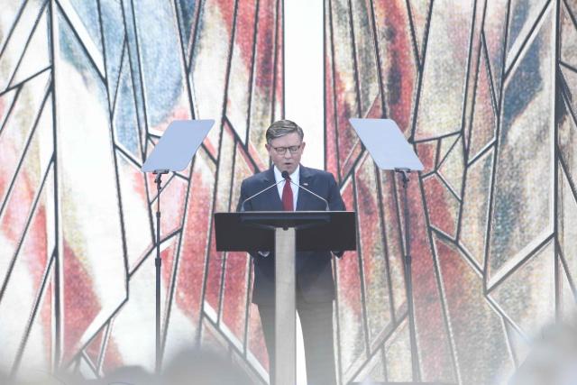US Speaker of the House Mike Johnson delivers a prayer during "Rededicate 250: A National Jubilee of Prayer, Praise and Thanksgiving" on the National Mall in Washington, DC, on May 17, 2026. (Photo by Matthew Hatcher / AFP)