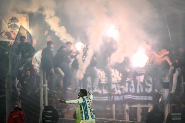 Le Havre's French defender #32 Timothee Pembele celebrates after winning the French L1 football match between FC Lorient and Le Havre Athletic Club at Yves-Allainmat stadium in Lorient, western France on May 17, 2026. (Photo by Loic VENANCE / AFP)