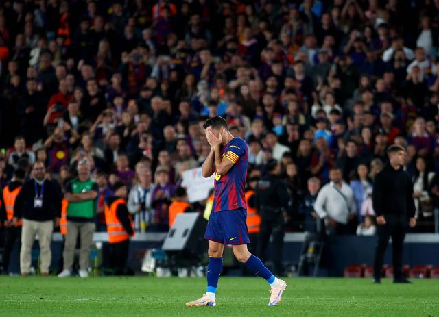 Barcelona's Polish forward #09 Robert Lewandowski gets emotional at the end of the Spanish league football match between FC Barcelona and Real Betis at the Camp Nou Stadium in Barcelona on May 17, 2026. Barcelona striker Robert Lewandowski said yesterday he is leaving the club this summer at the end of his contract. The veteran Polish forward, 37, scored 119 goals for Barcelona in 191 games across all competitions since joining from Bayern Munich in 2022. (Photo by JAIME REINA / AFP)