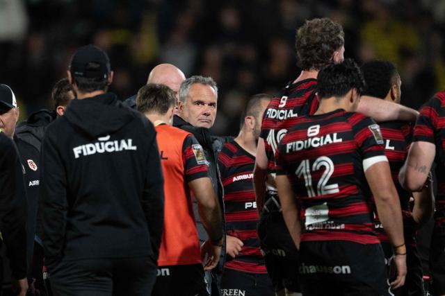 Toulouse's coach's Ugo Mola reacts at the end of the French Top14 rugby union match between Stade Rochelais (La Rochelle) and Toulouse at The Marcel-Deflandre Stadium in La Rochelle, western France on May 17, 2026. (Photo by XAVIER LEOTY / AFP)