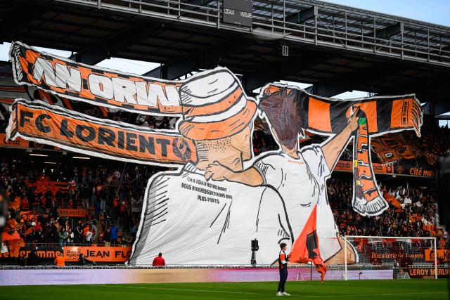 Lorient's supporters hold a tiffo during the French L1 football match between FC Lorient and Le Havre Athletic Club at Yves-Allainmat stadium in Lorient, western France on May 17, 2026. (Photo by Loic VENANCE / AFP)