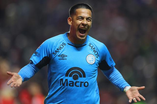 Belgrano's forward #22 Nicolas Fernandez celebrates after scoring a late equalising goal to force extra-time during the Argentine Professional Football League Apertura tournament semifinal match between Argentinos Juniors and Belgrano at the Diego Armando Maradona stadium in Buenos Aires on May 17, 2026. (Photo by Alejandro PAGNI / AFP)