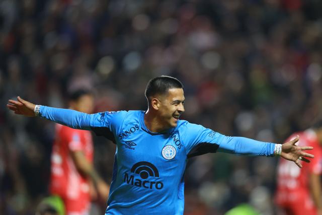 Belgrano's forward #22 Nicolas Fernandez celebrates after scoring a late equalising goal to force extra-time during the Argentine Professional Football League Apertura tournament semifinal match between Argentinos Juniors and Belgrano at the Diego Armando Maradona stadium in Buenos Aires on May 17, 2026. (Photo by Alejandro PAGNI / AFP)