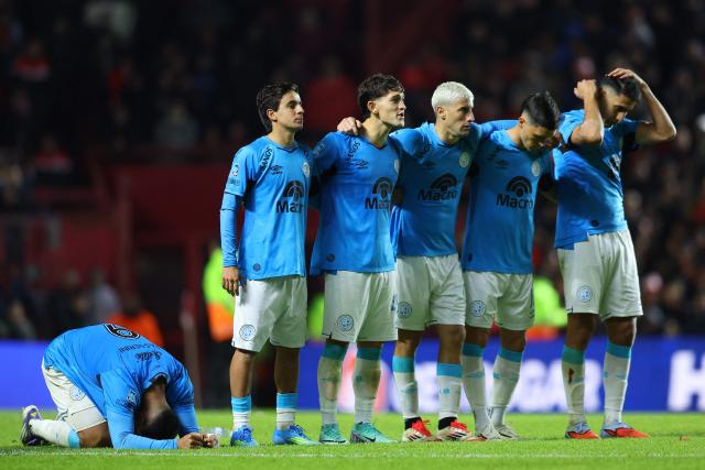 Belgrano players react during the penalty shoot-out of the Argentine Professional Football League Apertura tournament semifinal match between Argentinos Juniors and Belgrano at the Diego Armando Maradona stadium in Buenos Aires on May 17, 2026. (Photo by Alejandro PAGNI / AFP)