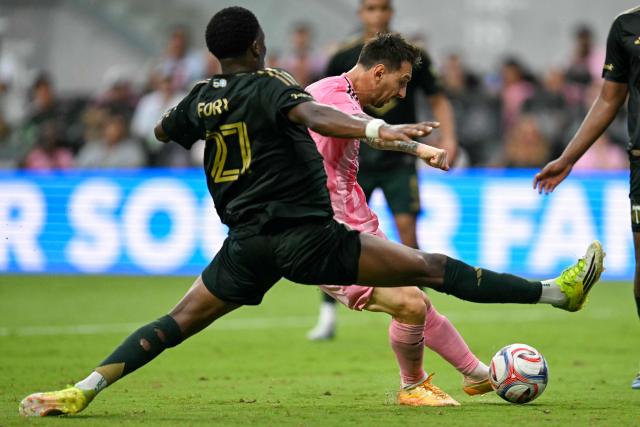Inter Miami's Argentine forward #10 Lionel Messi shoots to score a goal past Portland Timber's Colombian midfielder #27 Jimer Fory during a Major League Soccer (MLS) regular season football match between Intern Miami CF and Portland Timbers at Nu Stadium in Miami, Florida, on May 17, 2026. (Photo by CHANDAN KHANNA / AFP)
