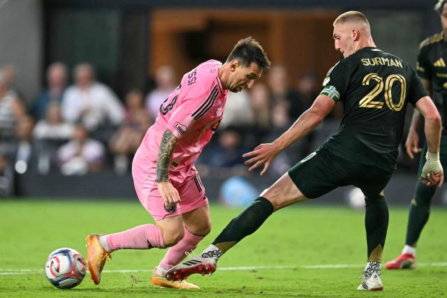 Inter Miami's Argentine forward #10 Lionel Messi (L) is defended by Portland Timber's New Zealander defender #20 Finn Surman during a Major League Soccer (MLS) regular season football match between Inter Miami CF and Portland Timbers at Nu Stadium in Miami, Florida, on May 17, 2026. (Photo by CHANDAN KHANNA / AFP)
