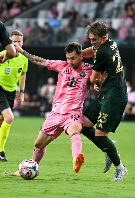 Inter Miami's Argentine forward #10 Lionel Messi (L) fights for the ball with Portland Timber's US defender #23 Ian Smith during a Major League Soccer (MLS) regular season football match between Inter Miami CF and Portland Timbers at Nu Stadium in Miami, Florida, on May 17, 2026. (Photo by CHANDAN KHANNA / AFP)