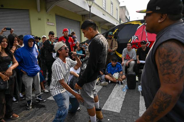 Guatemalan freestylers take part in a battle in the surroundings of Constitution Square in Guatemala City on May 17, 2026. (Photo by JOHAN ORDONEZ / AFP)