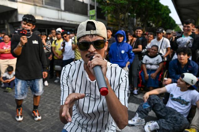 A Guatemalan freestyler takes part in a battle in the surroundings of Constitution Square in Guatemala City on May 17, 2026. (Photo by JOHAN ORDONEZ / AFP)