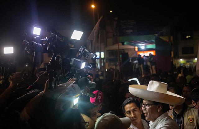 Peru's presidential candidate Roberto Sanchez, of the Juntos por el Peru party, talks to the media after a campaign rally in Lima on May 17, 2026. Left-wing candidate Roberto Sanchez has qualified for the runoff of Peru's presidential election and will face right-wing candidate Keiko Fujimori in June 7. (Photo by Ernesto BENAVIDES / AFP)