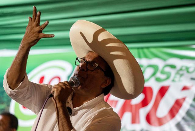 Peru's presidential candidate Roberto Sanchez, of the Juntos por el Peru party, delivers a speech during a campaign rally in Lima on May 17, 2026. Left-wing candidate Roberto Sanchez has qualified for the runoff of Peru's presidential election and will face right-wing candidate Keiko Fujimori in June 7. (Photo by Ernesto BENAVIDES / AFP)
