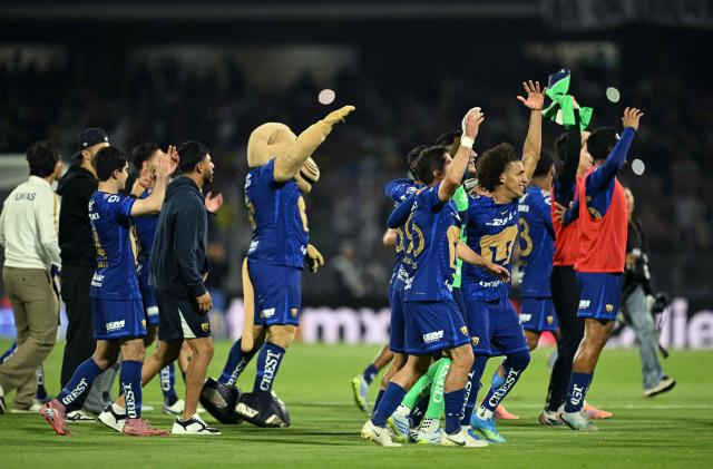 Pumas players celebrate after winning the Liga MX Clausura semifinal second-leg football match between Pumas UNAM and Pachuca at Olimpico Universitario stadium in Mexico City on May 17, 2026. (Photo by YURI CORTEZ / AFP)