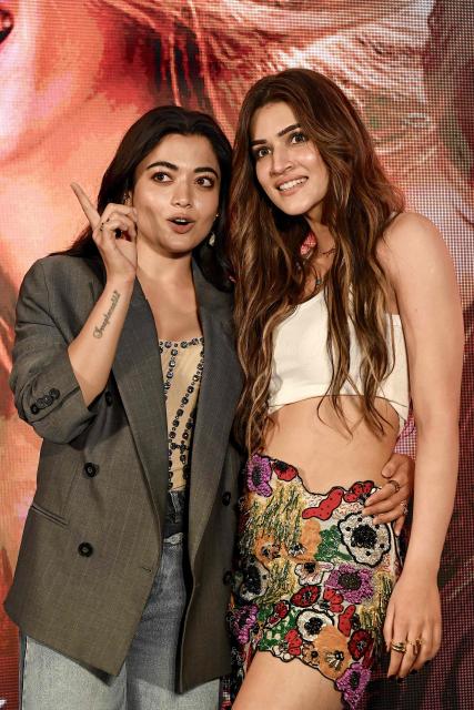 Bollywood actresses Rashmika Mandanna (L) and Kriti Sanon attend the song launch of their upcoming Indian Hindi-language romantic drama film 'Cocktail 2' in Mumbai on May 17, 2026. (Photo by Sujit JAISWAL / AFP)