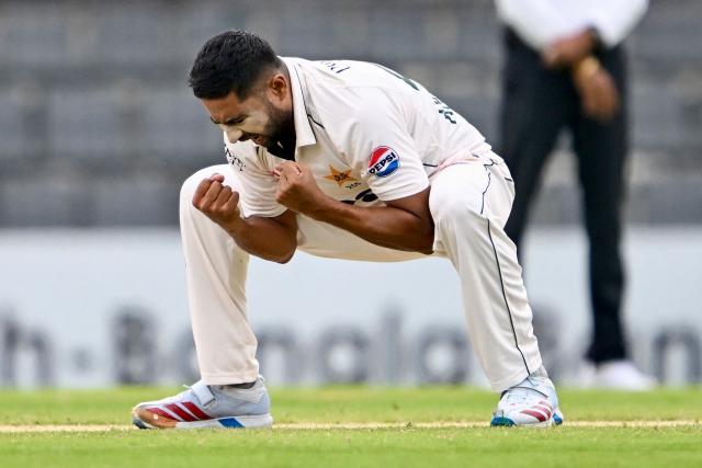 Pakistan’s Khurram Shahzad celebrates after taking the wicket of Bangladesh’s Najmul Hossain Shanto during the third day of the second Test cricket match between Bangladesh and Pakistan at the Sylhet International Cricket Stadium in Sylhet on May 18, 2026. (Photo by Munir UZ ZAMAN / AFP)