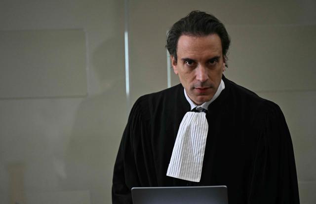 Lawyer Philippe Ohayon representing Félix Bingui, the alleged leader of the Yoda gang on drug trafficking charges arrives ahead of Bingui's trial at The Marseille Courthouse in Marseille, southern France on May 18, 2025. Described as the "undisputed leader" of the Yoda clan, which was defeated following a bloody war against the DZ Mafia in 2023, Félix Bingui, a prominent figure in Marseilles drug-related criminal underworld, is appearing in court on May 18, 2026 for a three-week trial alongside 19 co-defendants, all of whom are alleged members of his network. (Photo by Gabriel BOUYS / AFP)